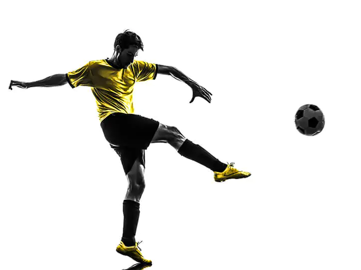 picture of a male soccer player kicking a ball for an Nsight article titled The Effects of Cocaine on Professional Performance